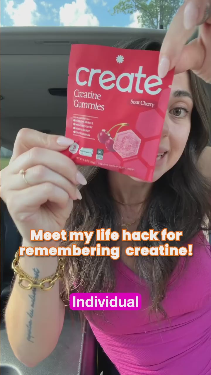 Creator holding a Sour Cherry pack in her car